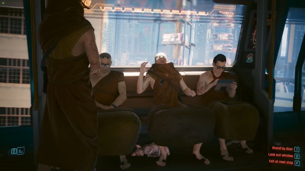 Four monks chilling in the metro 
