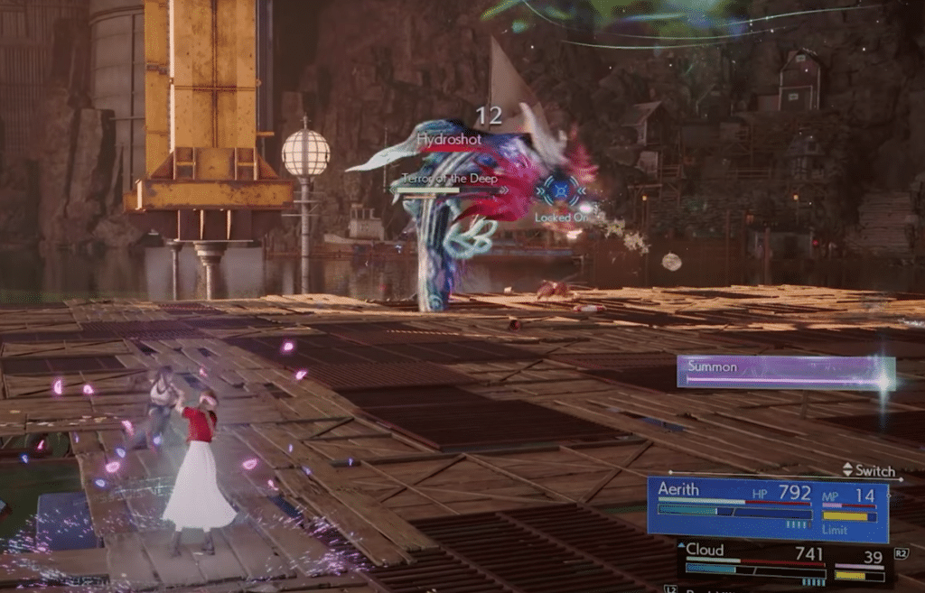 damaging the boss from range with aerith