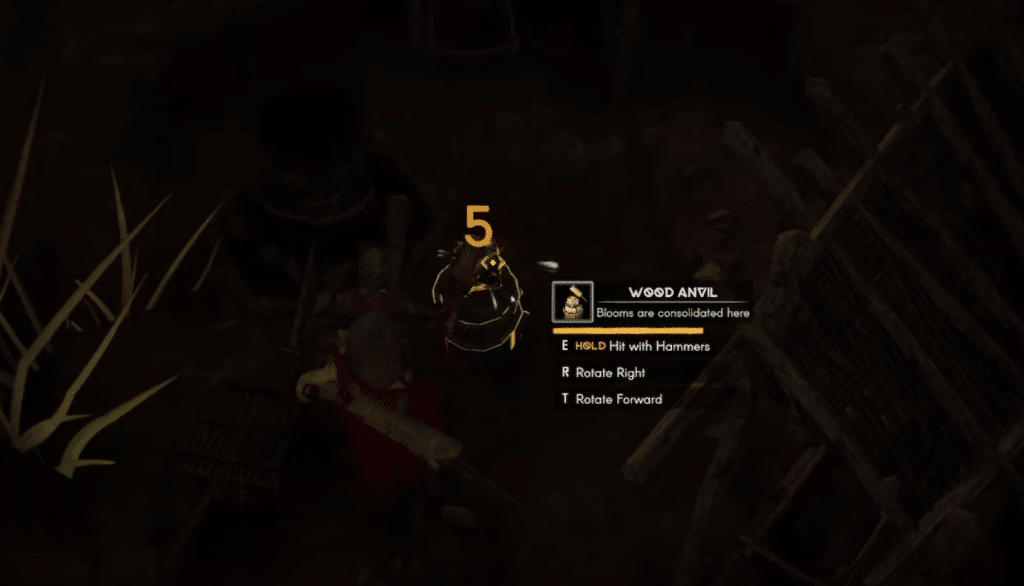 Hit the Iron Bloom with a hammer to remove slag from it
