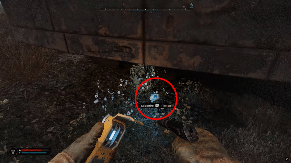 Sapphire artifact laying on the ground in Stalker 2